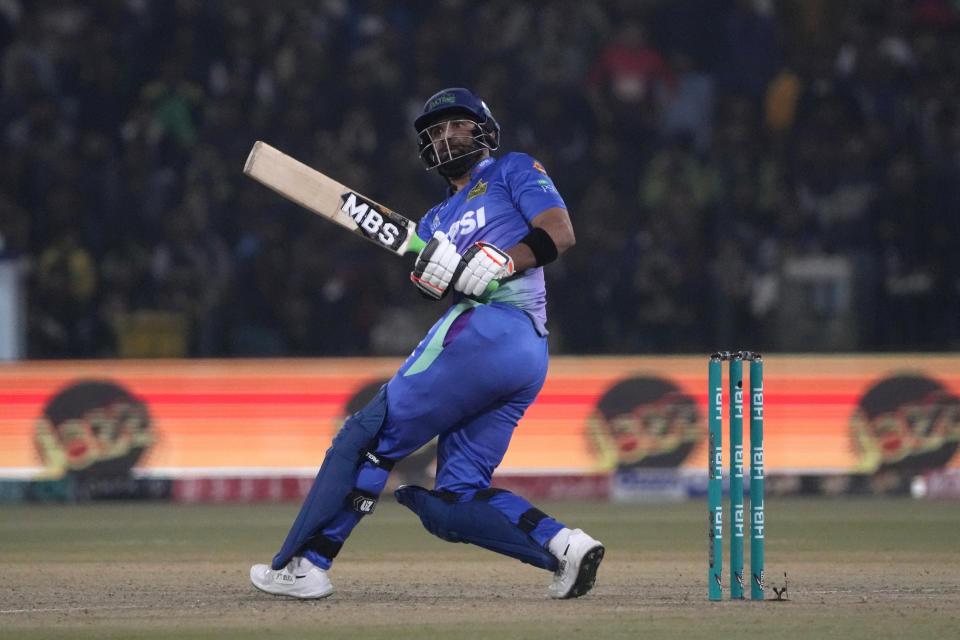 Multan Sultans' Iftikhar Ahmed follows the ball after playing a shot for boundary during the Pakistan Super League T20 cricket match between Multan Sultan and Lahore Qalandars, in Lahore, Pakistan, Tuesday, Feb. 27, 2024. (AP Photo/K.M. Chaudary)