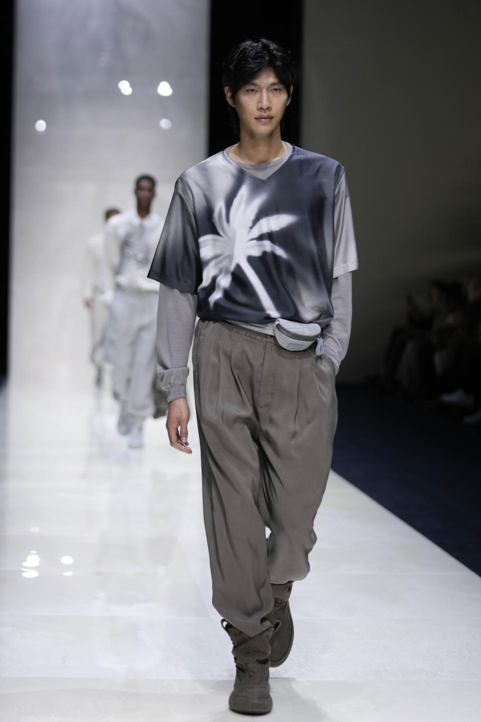 A model wears a creation as part of the Giorgio Armani Men's Spring Summer 2025 collection, that was presented in Milan, Italy, Monday, June 17, 2024. (AP Photo/Luca Bruno).