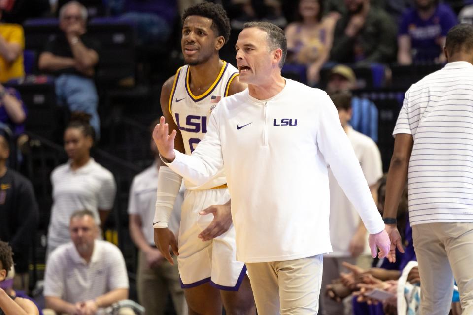 Feb 27, 2024; Baton Rouge, Louisiana, USA; LSU Tigers head coach Matt McMahon react to a play against the Georgia Bulldogs during the first half at Pete Maravich Assembly Center. Mandatory Credit: Stephen Lew-USA TODAY Sports