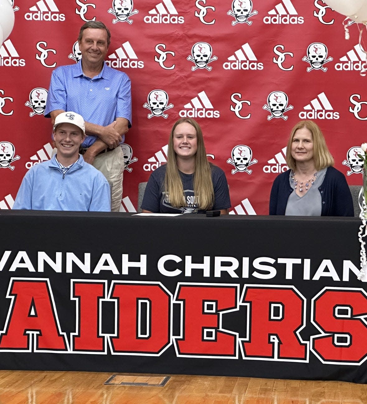 Mary Miller of Savannah Christian, pictured with her family, signed to play golf at Georgia Southern Wednesday.