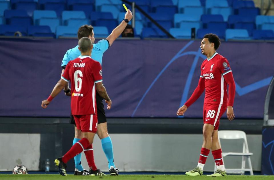 Trent Alexander-Arnold (right) is booked during Liverpool’s 3-1 defeat at Real Madrid in their Champions League quarter-final first leg.