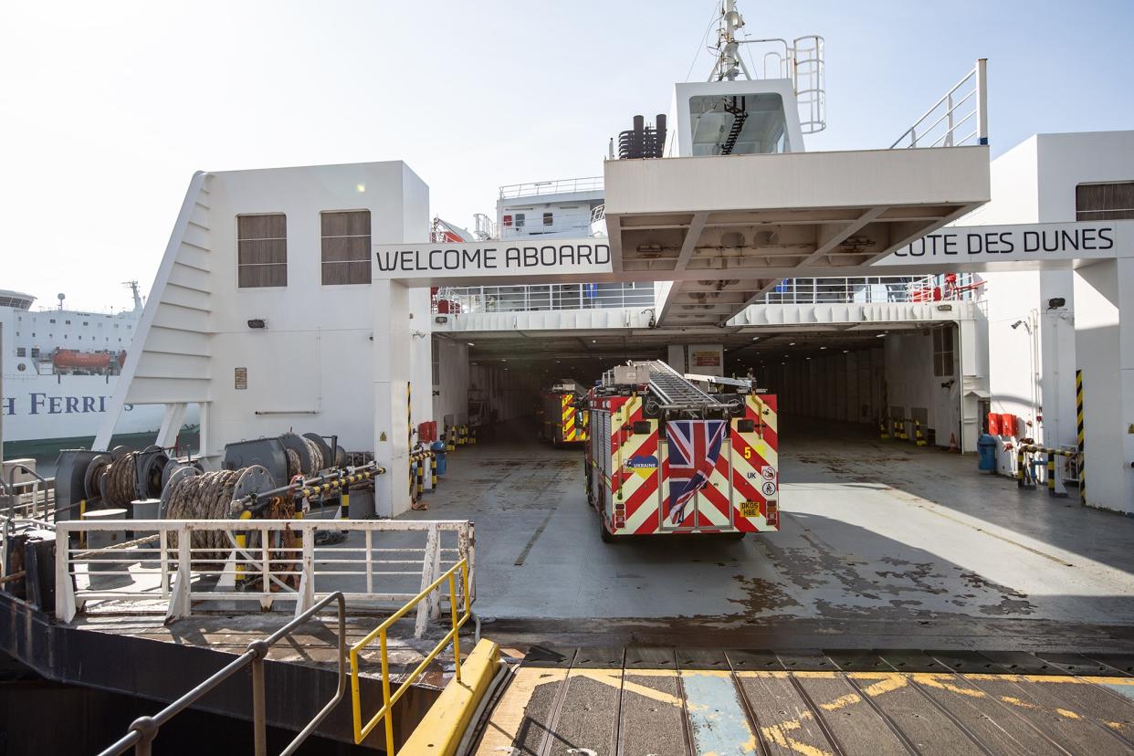 Fire engines from South Wales Fire and Rescue Service boarding a ferry from Kent before making its three-day journey to Poland