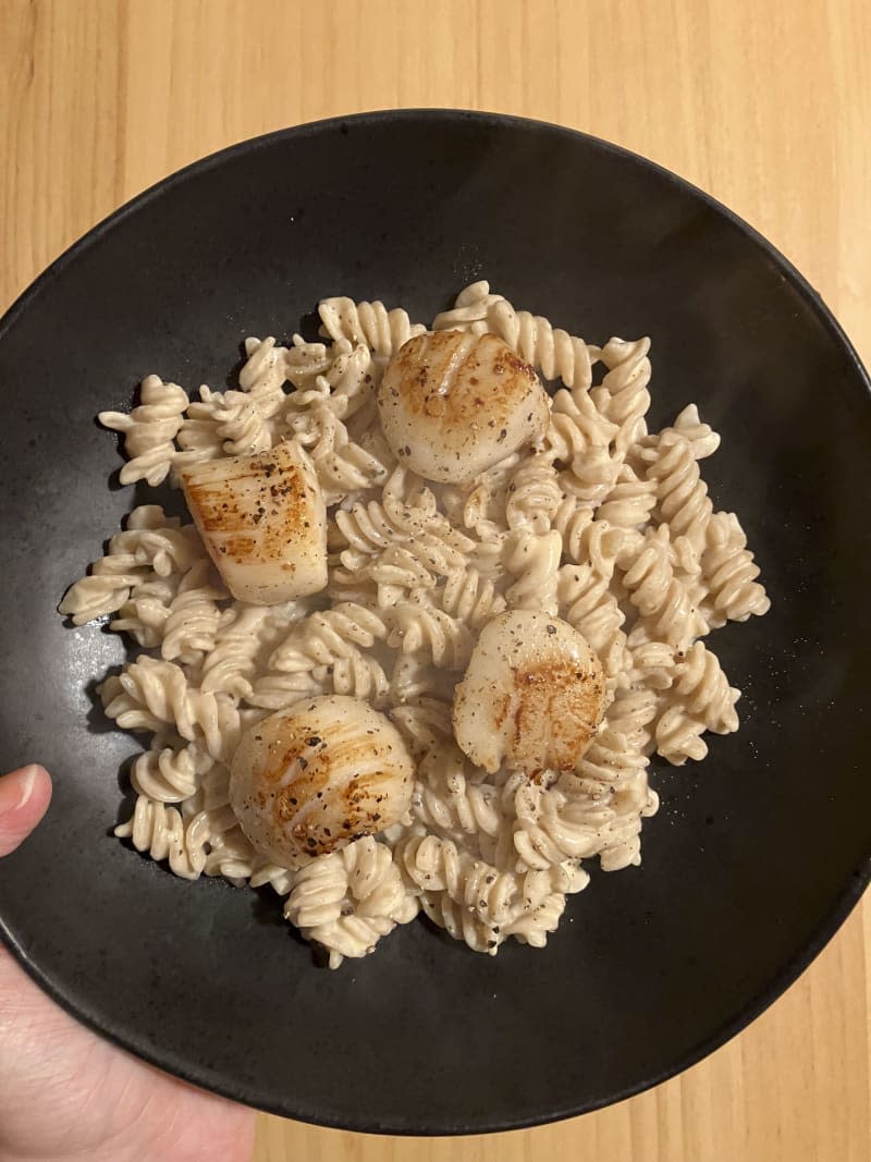 Scallop alfredo in a bowl.