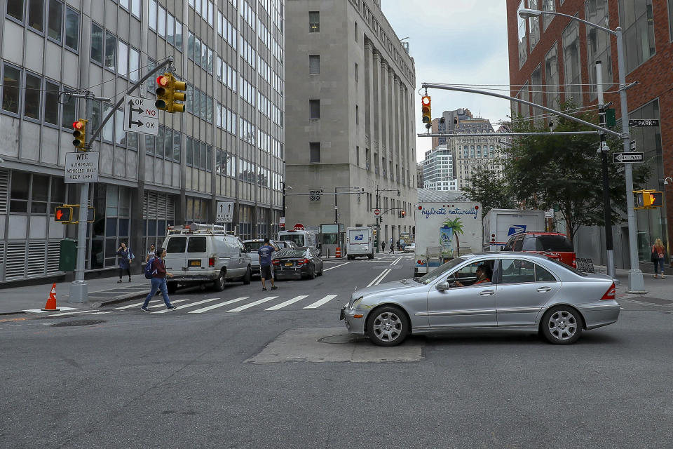 <p>The World Trade Center site is seen in the background as commuters head to work in Lower Manhattan on Sept. 7, 2018. (Photo: Gordon Donovan/Yahoo News) </p>