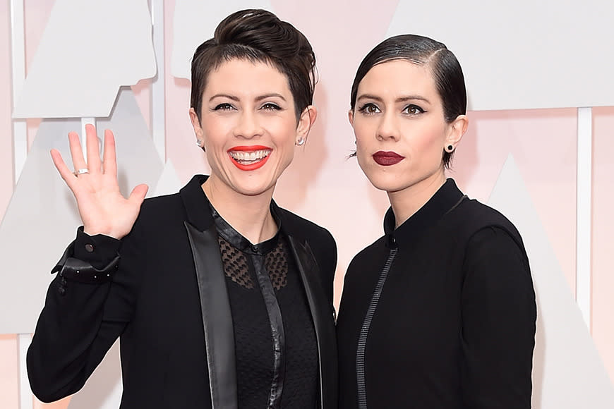 Canadian musicians - and twin sisters - Tegan and Sara lightened their matching all-black Oscars looks with statement lip colours. Tegan went for a classic bold red, while Sara sported a moodier plum lipstick.