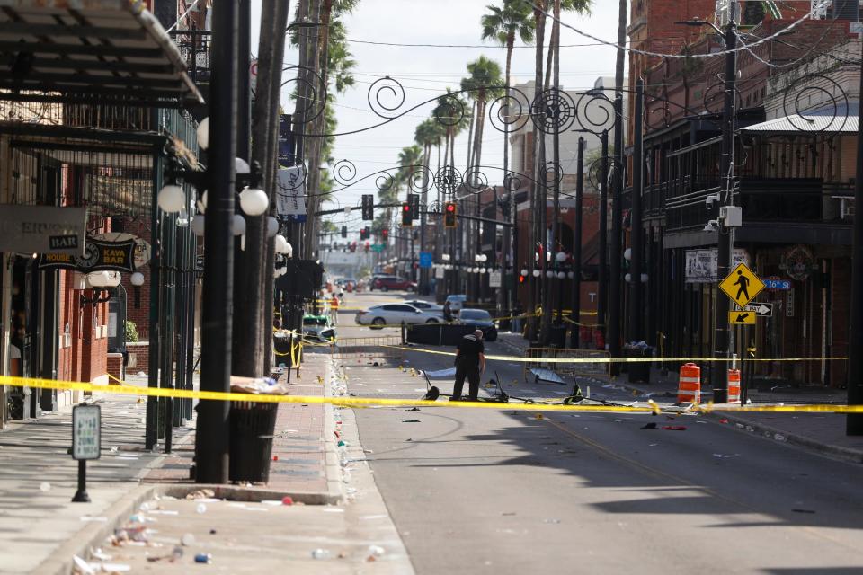 The Tampa Police Department and the Hillsborough County Sheriff's Office investigates a fatal shooting in the Ybor City neighborhood on Oct. 29, 2023 in Tampa, Florida. According to reports, two people from two different groups opened fire as hundreds of people were on the street early Sunday morning in an area filled with bars and clubs.