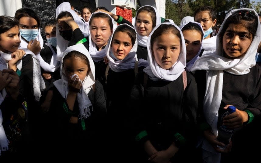 Girls walk to school in Kabul, amid growing concern over the Taliban's plans - GETTY