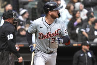 Detroit Tigers' Jake Rogers watches his solo home run as he rounds the bases during the fifth inning of a baseball game against the Chicago White Sox in Chicago, Sunday, March 31, 2024. (AP Photo/Nam Y. Huh)