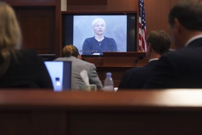 Actor Ellen Barkin testifies in a previously recorded video deposition at the Fairfax County Circuit Courthouse in Fairfax, Va., Thursday, May 19, 2022. Actor Johnny Depp sued his ex-wife Amber Heard for libel in Fairfax County Circuit Court after she wrote an op-ed piece in The Washington Post in 2018 referring to herself as a "public figure representing domestic abuse." (Shawn Thew/Pool Photo via AP)