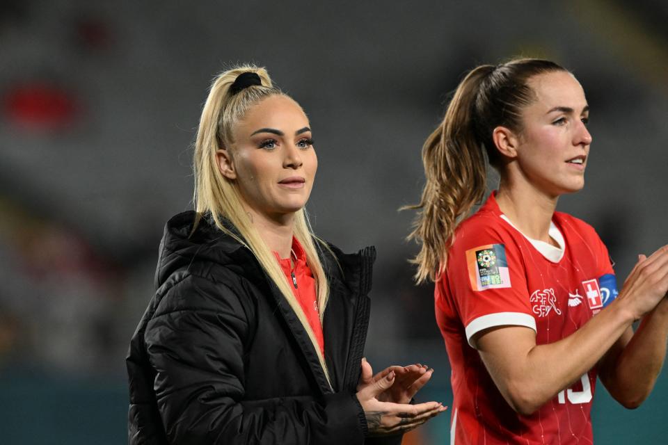 Switzerland's forward #23 Alisha Lehmann (L) applauds the fans after the end of the Australia and New Zealand 2023 Women's World Cup round of 16 football match between Switzerland and Spain at Eden Park in Auckland on August 5, 2023. (Photo by Saeed KHAN / AFP) (Photo by SAEED KHAN/AFP via Getty Images)