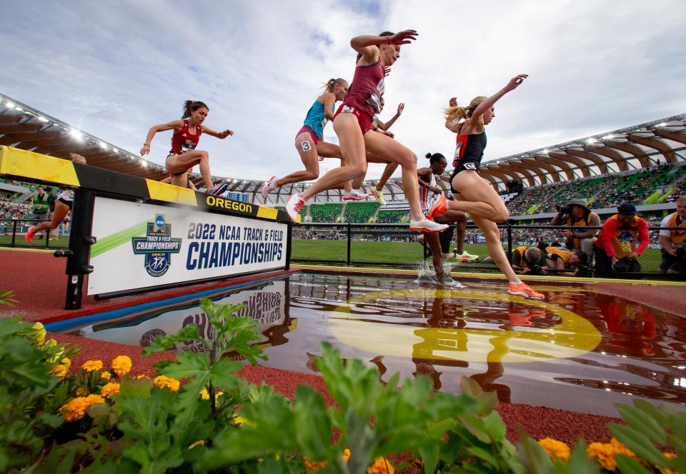 Oregon State’s Kaylee Mitchell leads a pack of runners over the water jump in the semifinals of the women’s 3,000 meter steeplechase on the second day of the NCAA Outdoor Track & Field Championships Thursday, June 9, 2022 at Hayward Field in Eugene, Ore. 