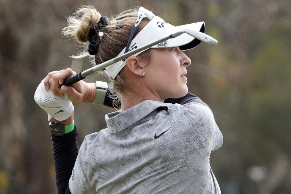 Nelly Korda hits from the ninth fairway during the final round of the LPGA Hilton Grand Vacations Tournament of Champions, Sunday, Jan. 22, 2023, in Orlando, Fla. (AP Photo/John Raoux)