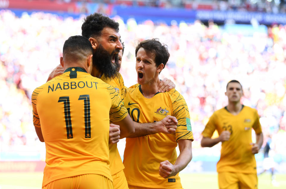 <p>Roo Beauty! Australia’s players come together to celebrate their equaliser (getty) </p>