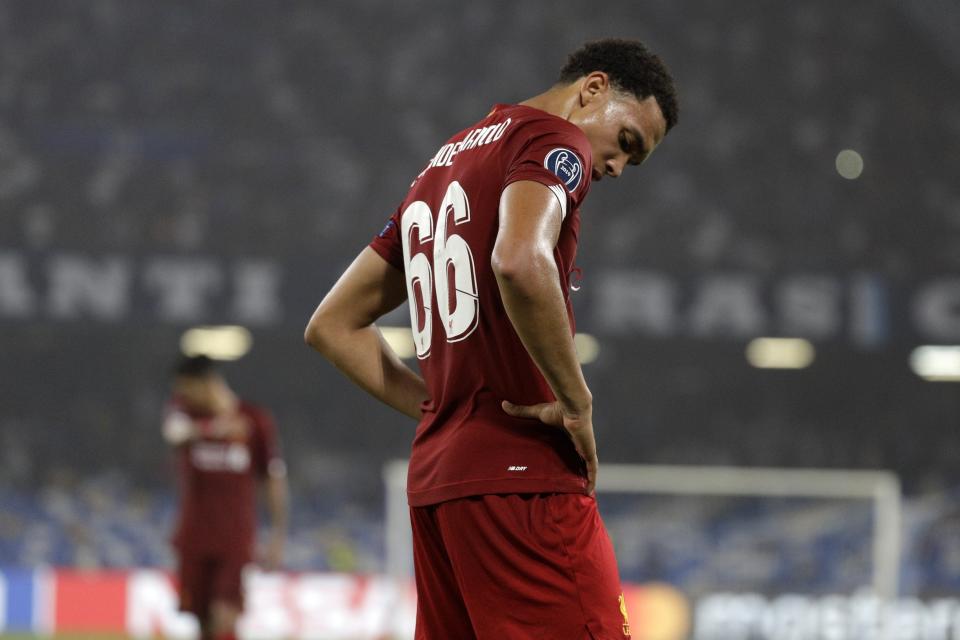 Liverpool's Trent Alexander-Arnold reacts after the Champions League Group E soccer match between Napoli and Liverpool, at the San Paolo stadium in Naples, Italy, Tuesday, Sept. 17, 2019. Napoli won 2-0. (AP Photo/Gregorio Borgia)