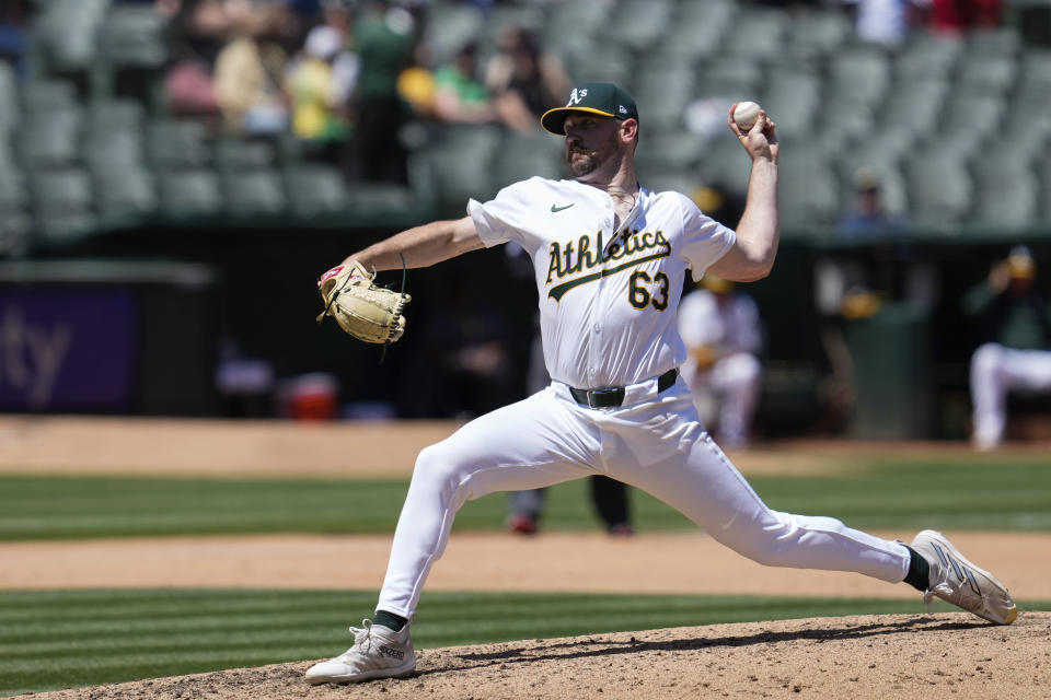 Oakland Athletics pitcher Hogan Harris throws to a Texas Rangers batter during the fifth inning of a baseball game Tuesday, May 7, 2024, in Oakland, Calif. (AP Photo/Godofredo A. Vásquez)