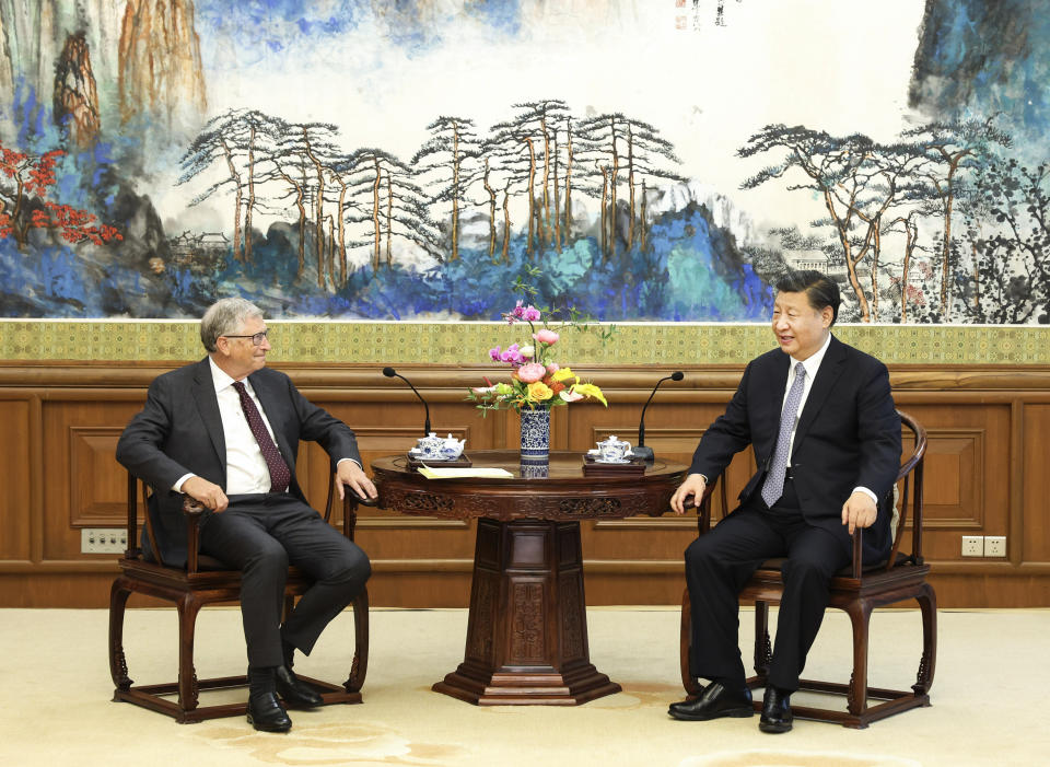 In this photo released by China's Xinhua News Agency, Bill Gates, left, meets with Chinese President Xi Jinping in Beijing, Friday, June 16, 2023. Microsoft's co-founder Bill Gates has met with Chinese President Xi Jinping just days after a visit to Beijing by Tesla CEO Elon Musk. The state broadcaster CCTV showed Xi saying he was happy to see Gates, who he called an "old friend," after three years without meeting during the pandemic. (Yin Bogu/Xinhua via AP)