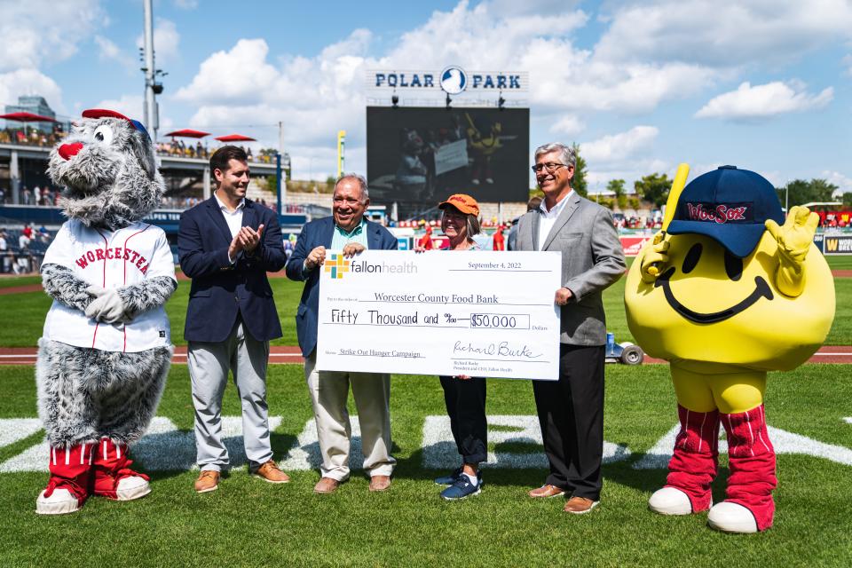 Fallon Health's presentation of a $50,000 check to the Worcester County Food Bank was made Sunday, thanks to WooSox pitchers' proficiency of striking out hitters at Polar Park.