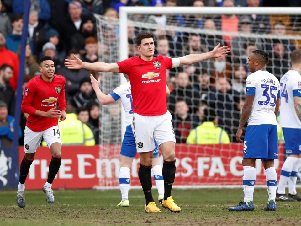 Harry Maguire celebrates scoring Manchester United's opener: Reuters