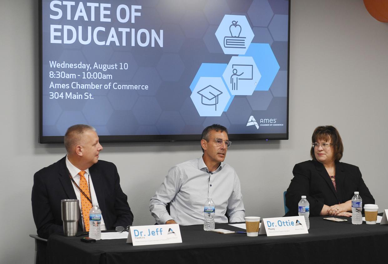 From left, Jeff Hawkins, Ames associate superintendent;  Ottie Maxey, Ballard superintendent; and Christine Trujilo, Gilbert superintendent, speak during the "State of Education" forum at the Ames Chamber of Commerce on Main Street on Wednesday, Aug. 10, in Ames, Iowa.