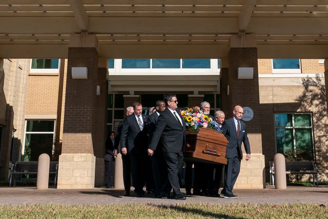 <p>ALEX BRANDON/POOL/AFP via Getty </p> Former and current US Secret Service agents assigned to the Carter detail, carry casket of former first lady Rosalynn Carter at Phoebe Sumter Medical Center in Americus, Georgia, on November 27, 2023