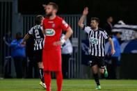 Football Soccer - Angers SCO v EA Guingamp - French Cup semi-final - Raymond Kopa Stadium, Angers, France - 25/04/2017. Angers' Thomas Mangani celebrates with a team mate after scoring. REUTERS/Stephane Mahe -