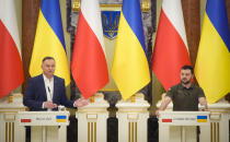 Ukrainian President Volodymyr Zelenskyy, right, and Polish President Andrzej Duda, attend a news conference after their meeting in Kyiv, Ukraine, Sunday, May 22, 2022. (AP Photo/Efrem Lukatsky)