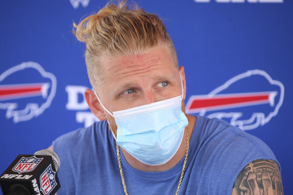 FILE - Buffalo Bills receiver Cole Beasley addresses the media following practice at NFL football training camp in Orchard Park, N.Y., in this Wednesday, July 28, 2021, file photo. The NFL can’t mandate the vaccine but it made its stance clear through strict protocols for players who don’t get it. Cole Beasley has strongly argued against the vaccine, even engaging in public debate with teammates about it on Twitter. “I’m not anti- or pro-vax. I’m pro choice,” Beasley said. (AP Photo/Jeffrey T. Barnes, File)