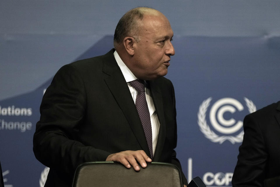 Sameh Shoukry, president of the COP27 climate summit, leaves after a review of the state of discussions at the summit, Friday, Nov. 18, 2022, in Sharm el-Sheikh, Egypt. (AP Photo/Nariman El-Mofty)