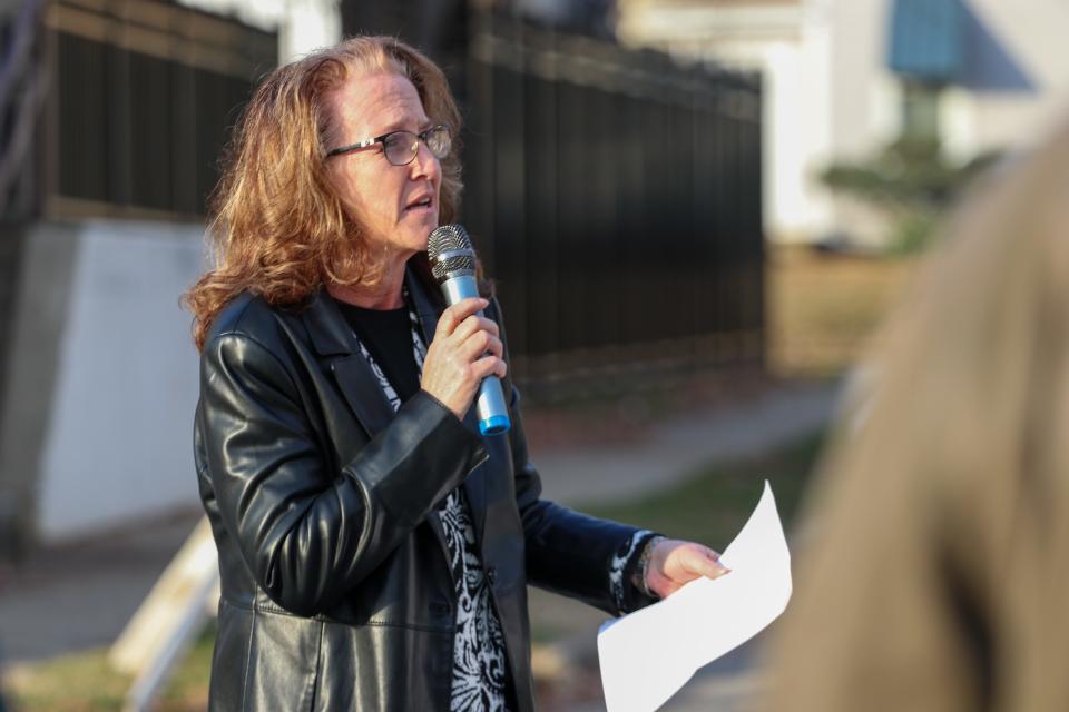 Jennifer Layton, CEO of LTHC Homeless Service speaks at the Homeless Person's Memorial vigil outside of the LTHC Homeless Service and the Salvation Army buildings, on Thursday, Dec. 21, 2023, in Lafayette, Ind.