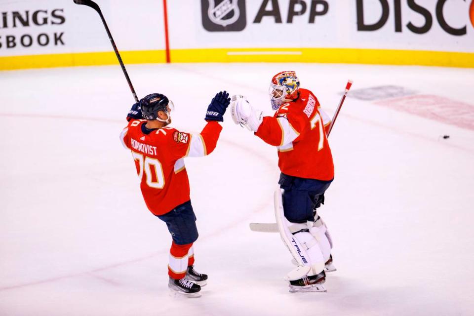 Florida Panthers players Sergei Bobrovsky (72) and Patric Hornqvist (70) celebrate their 5-3 win over the Washington Capitals during Game 5 of a first round NHL Stanley Cup series at FLA Live Arena on Wednesday, May 11, 2022 in Sunrise, Fl.