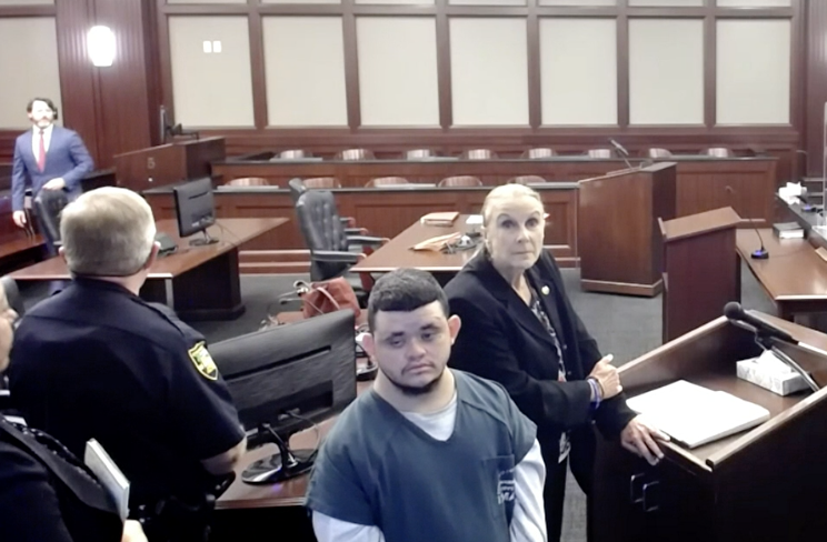 Yery Noel Medina Ulloa, center, pleads guilty Friday to second-degree murder and tampering with evidence in the 2021 stabbing death of 46-year-old Francisco Javier Cuellar in Jacksonville. He is a Honduran citizen who was living her illegally and now has been sentenced to 60 years in prison.