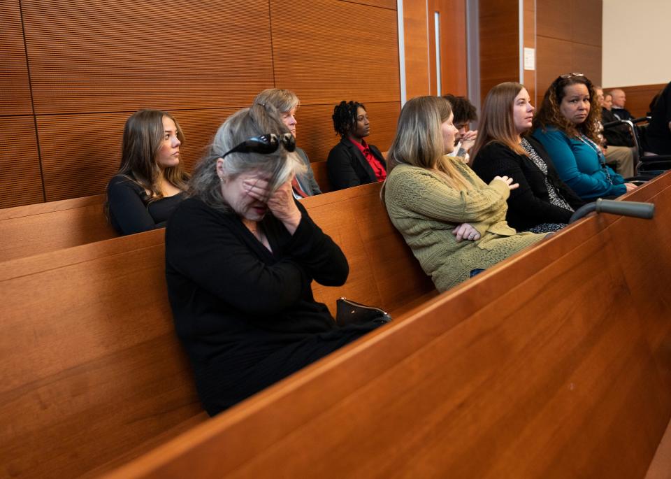 Family members of Donna Dalton Castleberry become emotional while a cellphone recording is played from the time of her fatal shooting in 2018 during opening statements in the trial of former Columbus police vice officer Andrew Mitchell. Mitchell, who had his cellphone recording during the encounter with Castleberry, is charged with murder and voluntary manslaughter in the fatal shooting of the 23-year-old Castleberry.