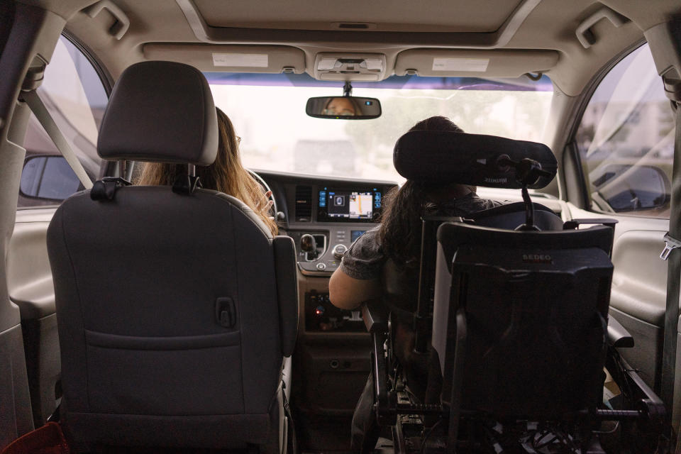 Moonan and her twin sister, Laura, ride in her accessible van to dinner.<span class="copyright">Morgan Lieberman</span>