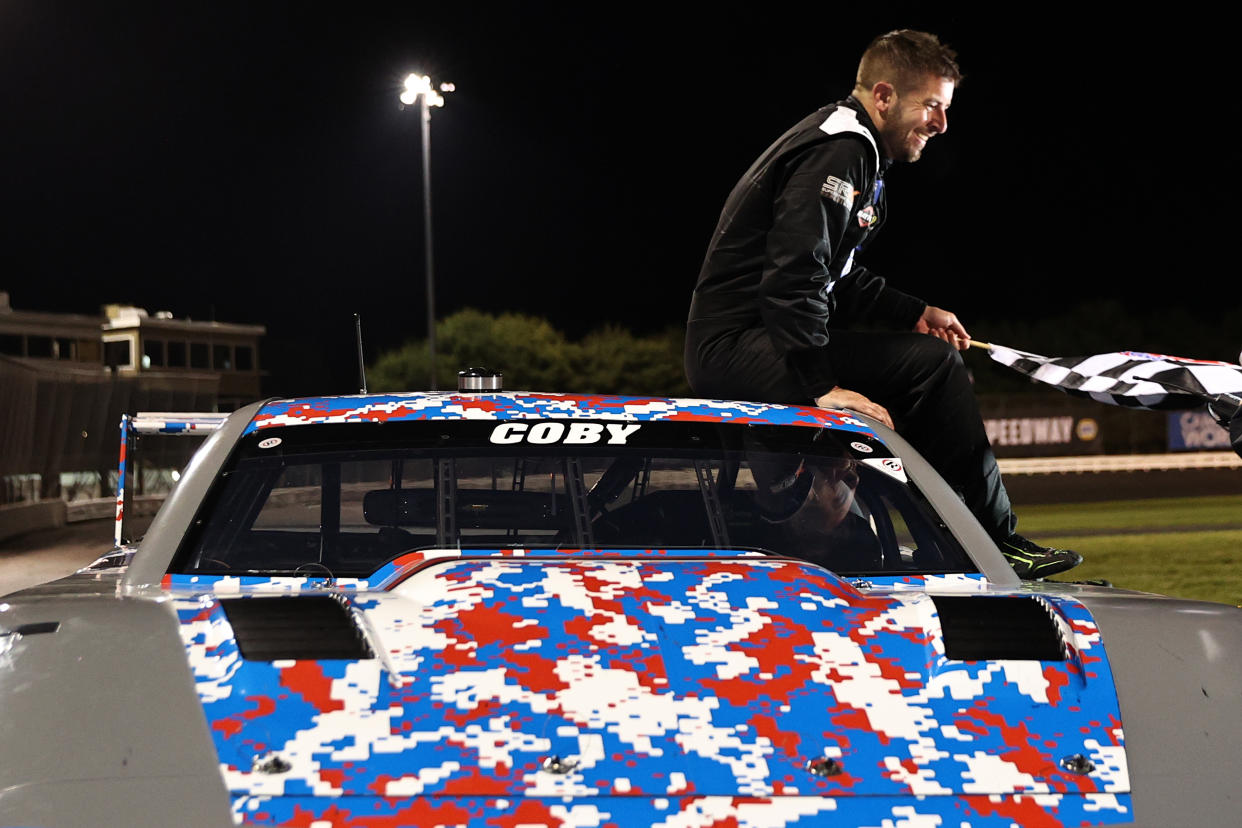 STAFFORD SPRINGS, CONNECTICUT - JUNE 12: SRX driver Doug Coby celebrates after winning the Inaugural Superstar Racing Experience Event at Stafford Motor Speedway on June 12, 2021 in Stafford Springs, Connecticut. (Photo by Elsa/SRX/Getty Images)