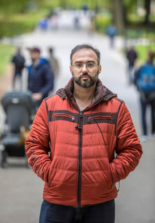 Author and blogger Iyad el-Baghdadi poses for a photo, as he says he is under protection custody in Norway, after the CIA warned him of being threatened by Saudi Arabia, in Oslo, Norway. May 7, 2019. Picture taken May 7. Ole Berg-Rusten/ NTB Scanpix/via REUTERS ATTENTION EDITORS - THIS IMAGE WAS PROVIDED BY A THIRD PARTY. NORWAY OUT. NO COMMERCIAL OR EDITORIAL SALES IN NORWAY.