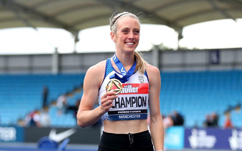 Jemma Reekie celebrates with her medal after winning the Women's 800m final during day three of the Muller UK Athletics Championships held at the Manchester Regional Arena. - PA