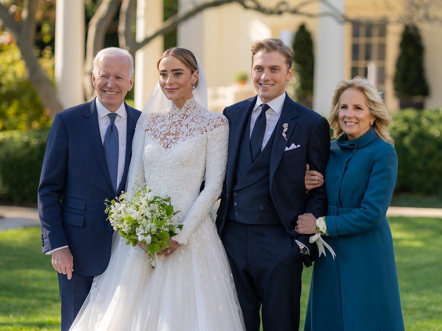 Newlyweds Naomi Biden and Peter Neal posed for wedding photos at the White House with President Biden and Dr. Jill Biden on November 19, 2022.