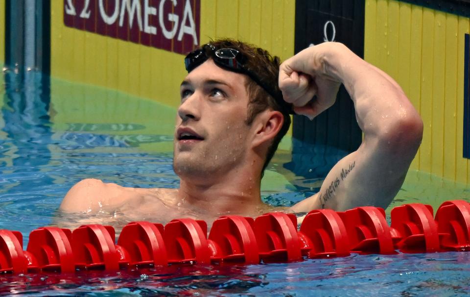 Hunter Armstrong reacts after swimming in the 100-meter freestyle during the U.S. Olympic Team Trials Tuesday in Indianapolis.