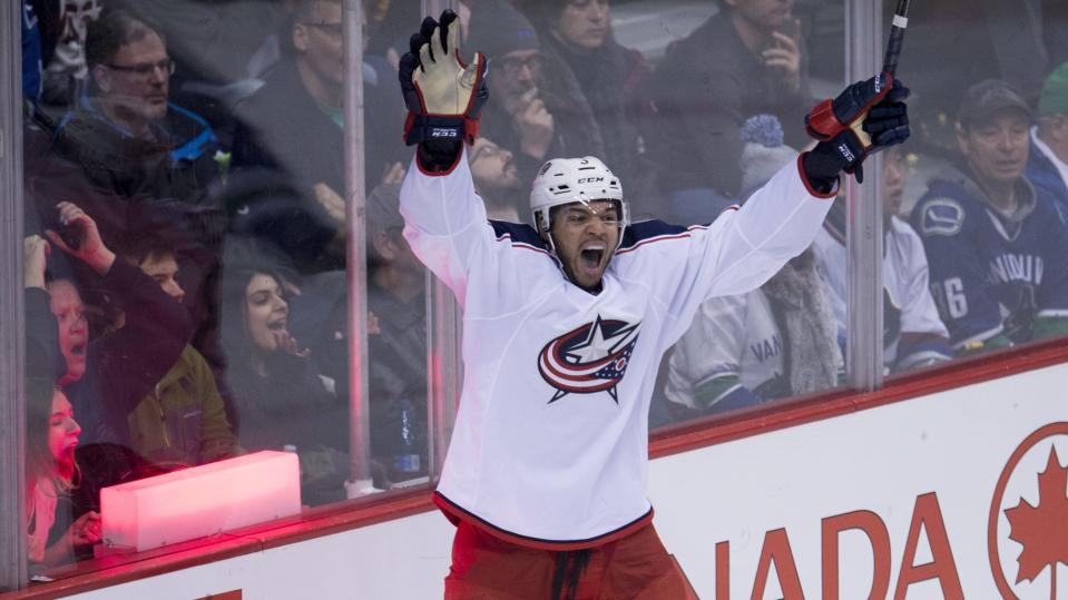 Columbus Blue Jackets defenseman Seth Jones (3) celebrates his goal against the Vancouver Canucks in overtime of an NHL hockey game, Sunday, Dec. 18, 2016 in Vancouver, British Columbia. (Jonathan Hayward/The Canadian Press via AP)