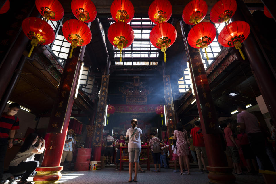 AP PHOTOS Asia Lunar New Year of the Dragon with temple