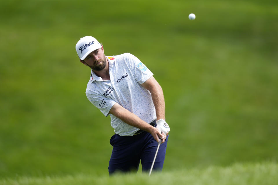 Cameron Young chips to the green on the sixth hole during the first round of the John Deere Classic golf tournament, Thursday, July 6, 2023, at TPC Deere Run in Silvis, Ill. (AP Photo/Charlie Neibergall)