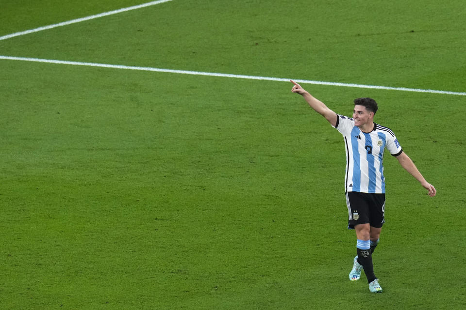 Argentina's Julian Alvarez celebrates after scoring his side's second goal during the World Cup round of 16 soccer match between Argentina and Australia at the Ahmad Bin Ali Stadium in Doha, Qatar, Saturday, Dec. 3, 2022. (AP Photo/Manu Fernandez)