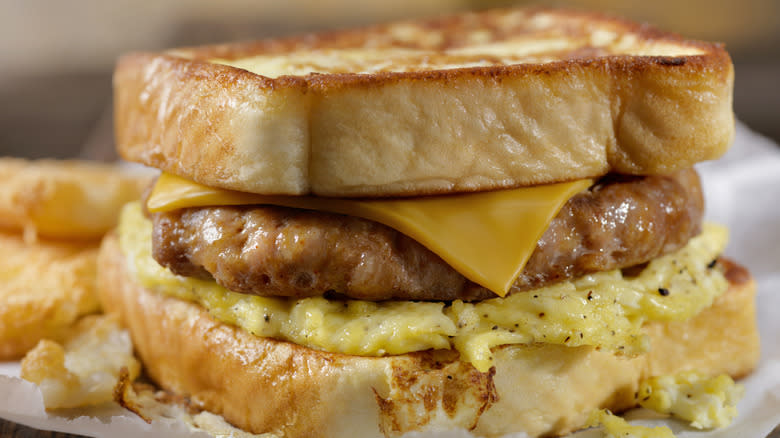 Breakfast sandwich with egg, cheese and sausage