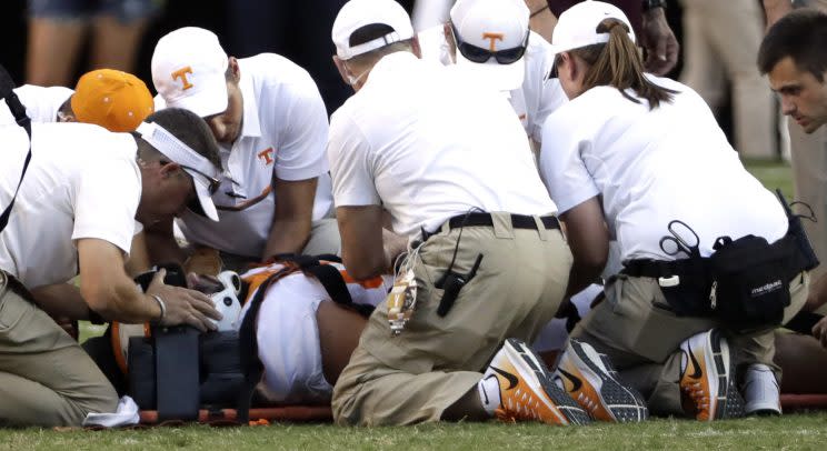 Medical personnel work on Tennessee defensive lineman Danny O'Brien (AP )