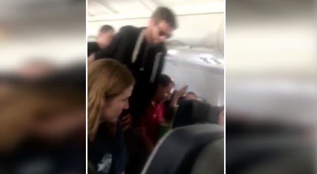 The man was escorted off the plane. Source: Twitter/topfiguresal via Storyful