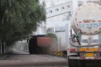 Truck transports coal at a coal-fired power plant in Shenyang