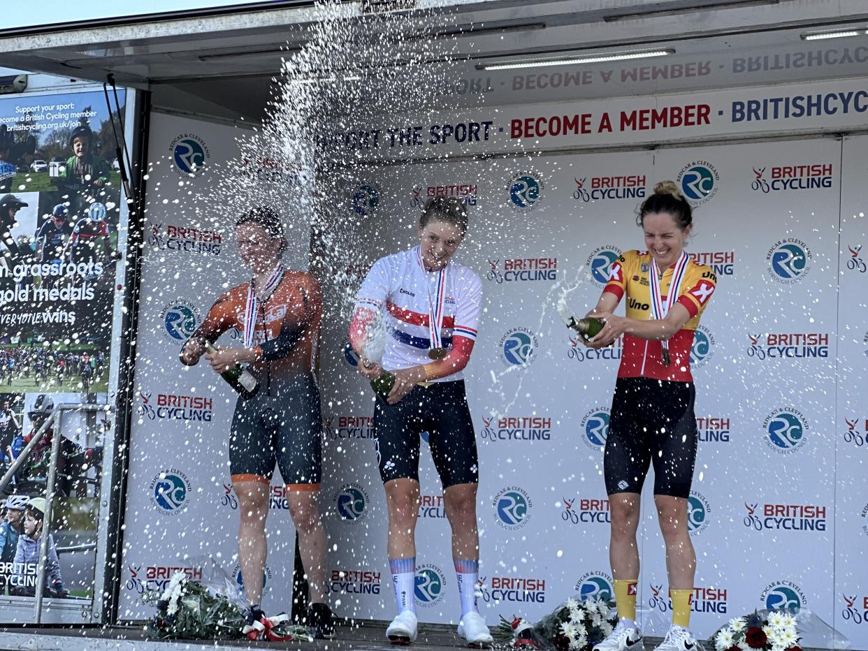 Elinor Barker, right, celebrates finishing third in the British national time trial behind Lizzie Holden (centre) and Anna Morris (left) on Wednesday (Ian Parker/PA)