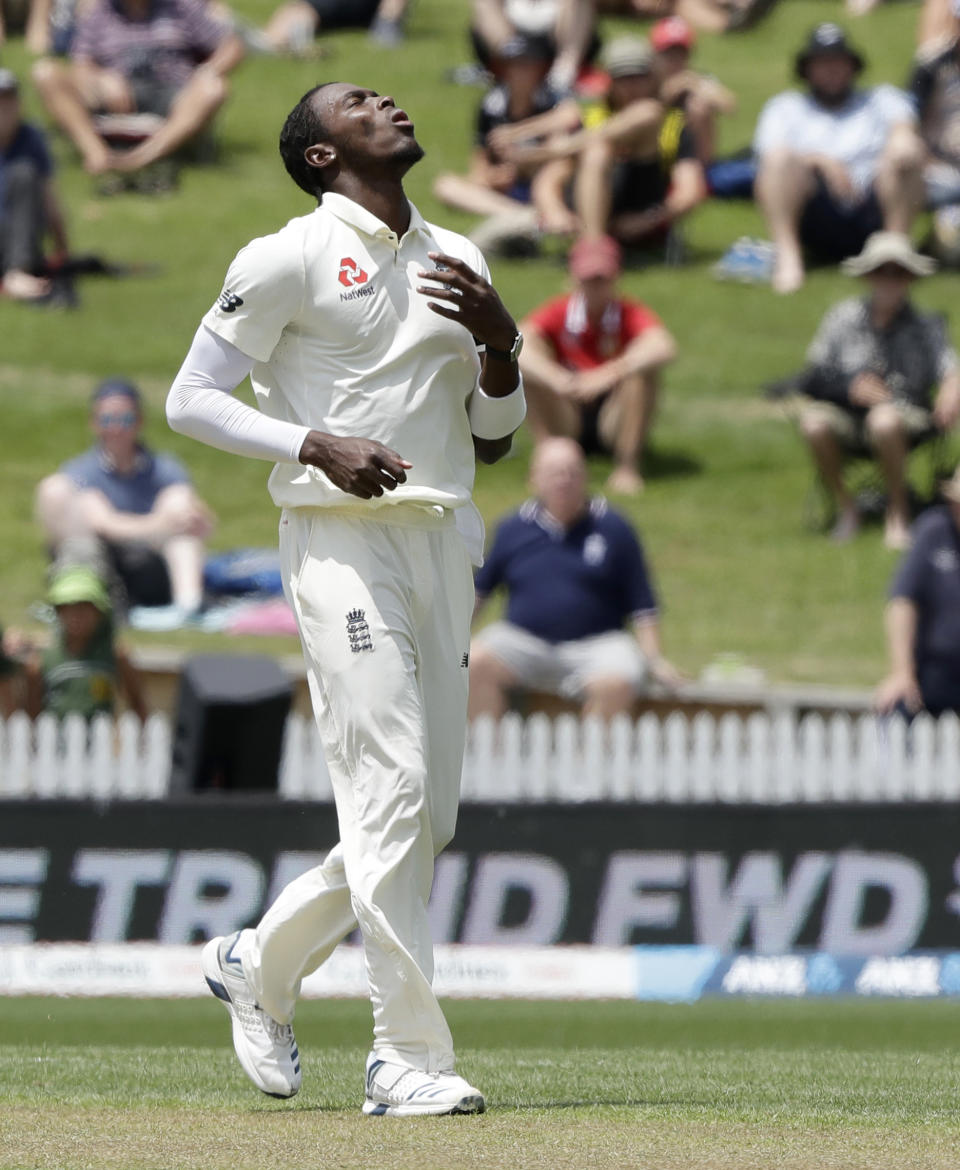England bowler Jofra Archer reacts during play on day one of the second cricket test between England and New Zealand at Seddon Park in Hamilton, New Zealand, Friday, Nov. 29, 2019. (AP Photo/Mark Baker)