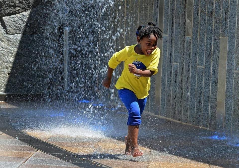 The fountain at Romare Bearden Park in uptown offers cool relief on hot summer days. A dangerous heat wave and severe storms with hail and damaging winds threaten the Charlotte region, National Weather Service meteorologists said Friday, June 30, 2023.