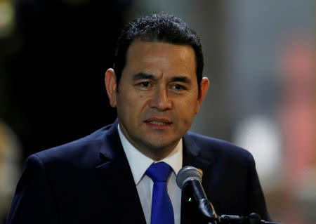 FILE PHOTO: Guatemala's President Jimmy Morales speaks to the media after his arrival at Mariscal Sucre Airport in Quito, Ecuador May 23, 2017 ahead of Ecuadorean president inauguration. REUTERS/Henry Romero/File Photo